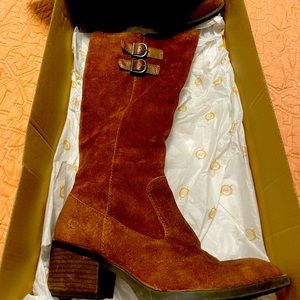 Born basil/rust colored calf length boots. Worn twice.